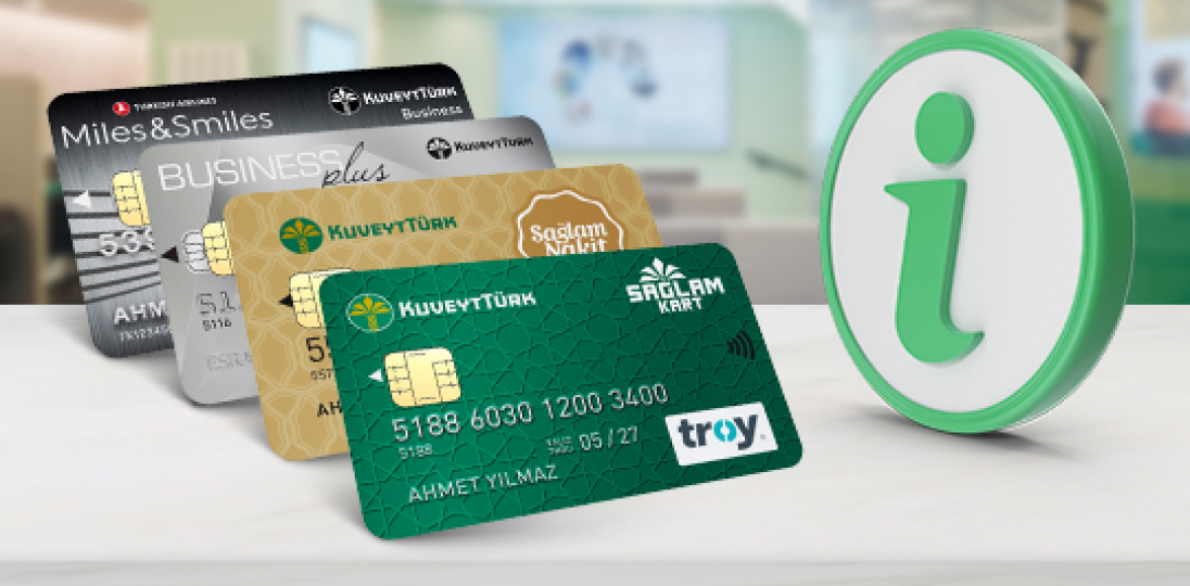 Various bank cards displayed with information icon on desk